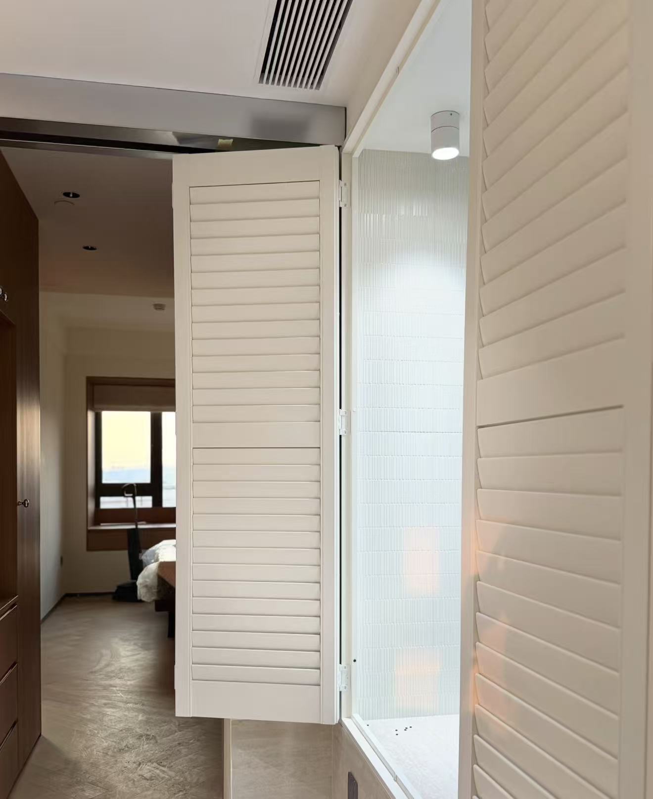 Bi-fold shutters folded open