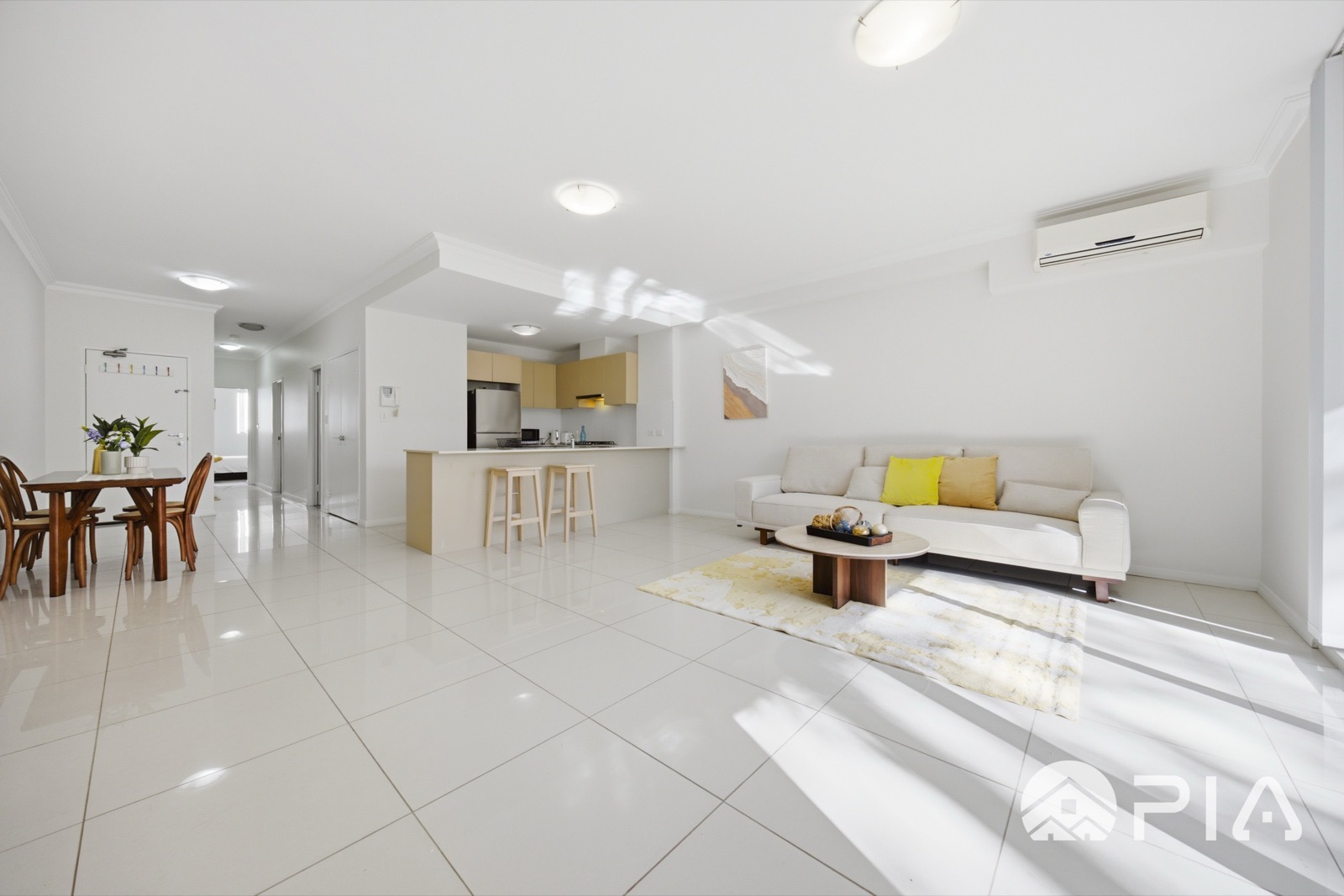 Airbnb open-plan living, dining and kitchen styled for guests