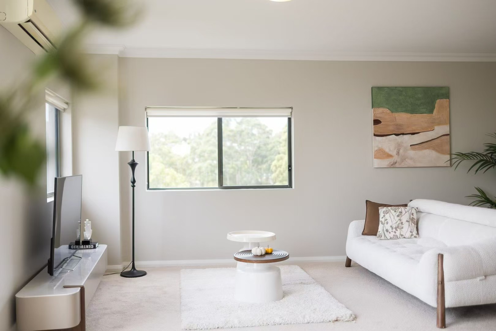 Styled living room with bouclé sofa