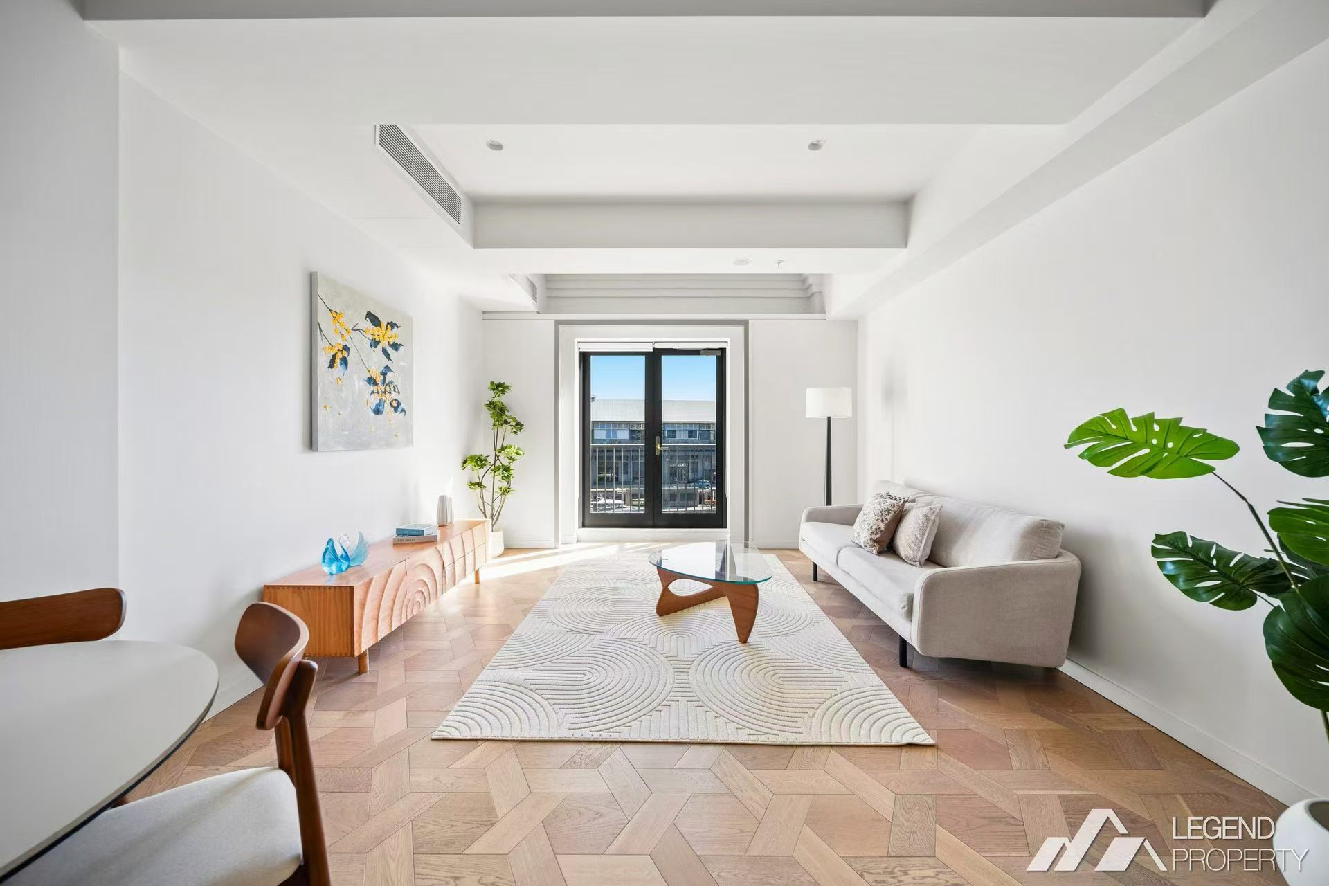 Bright living room with herringbone floor