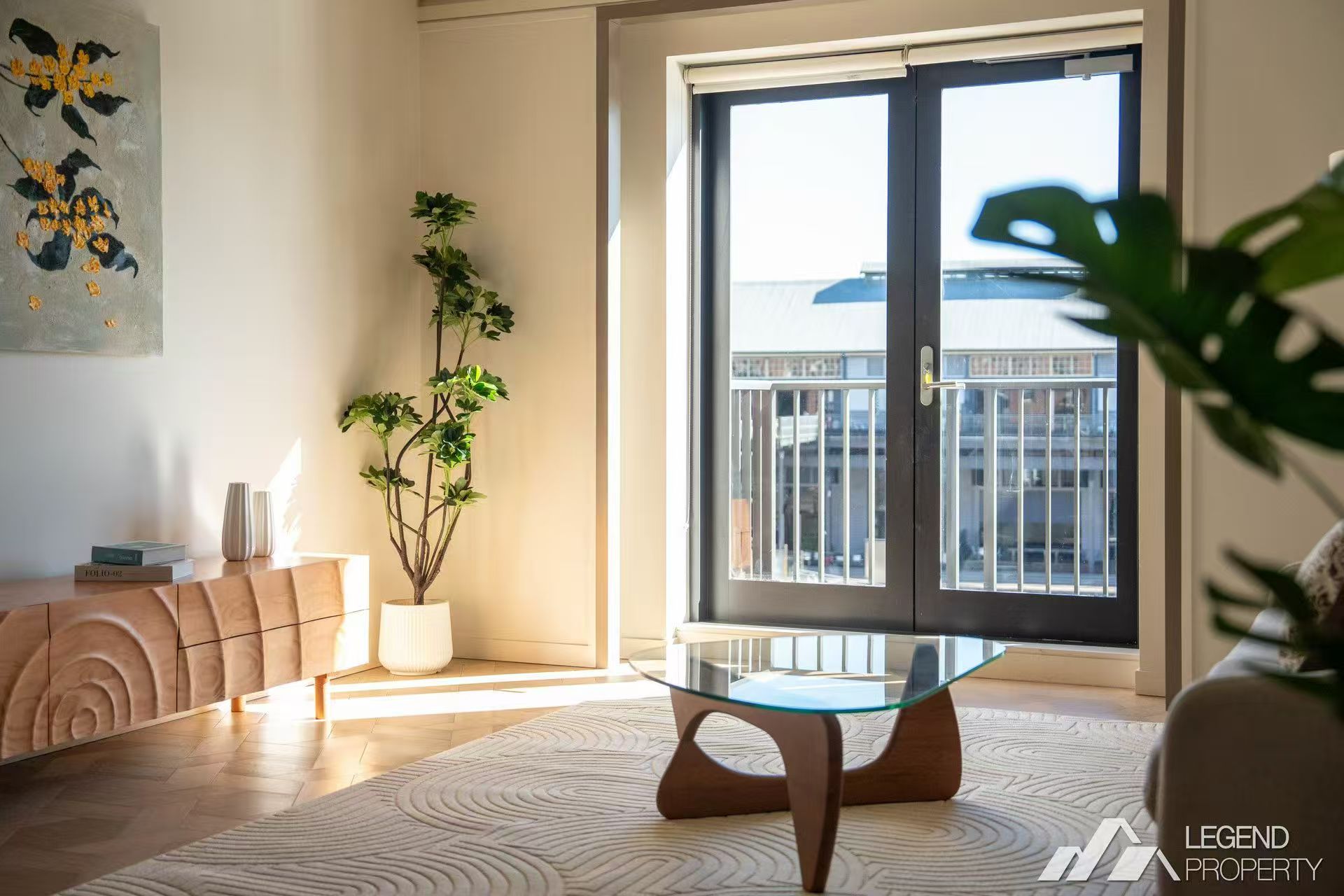 Living room styled with sculptural timber sideboard